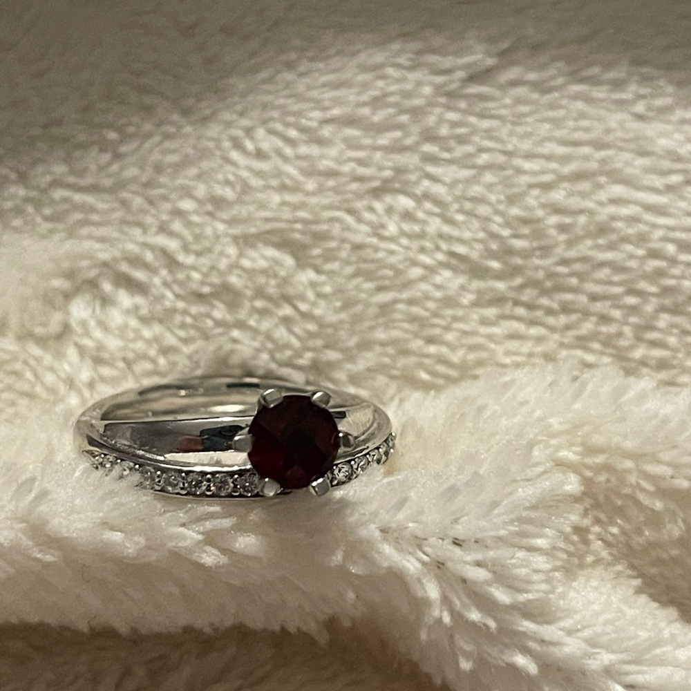 Sterling silver garnet ring. About size 8